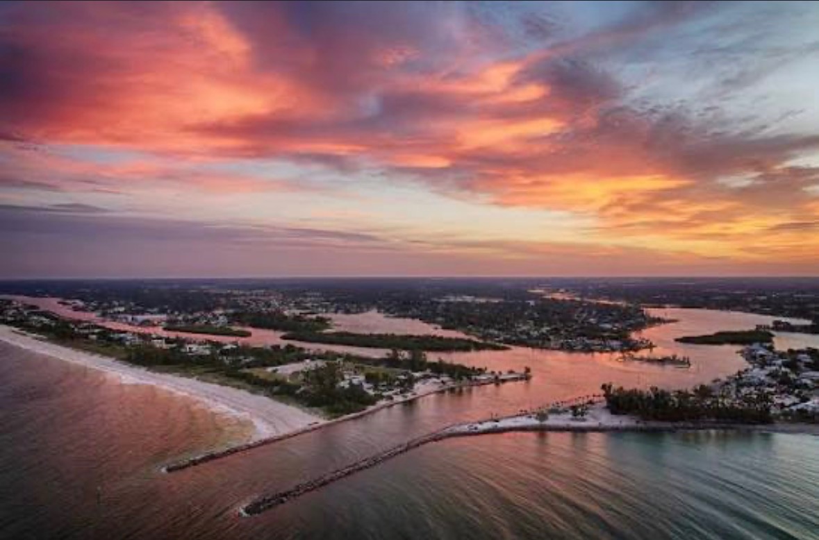 Aerial sunset over the coastline and waterways of Venice, Florida